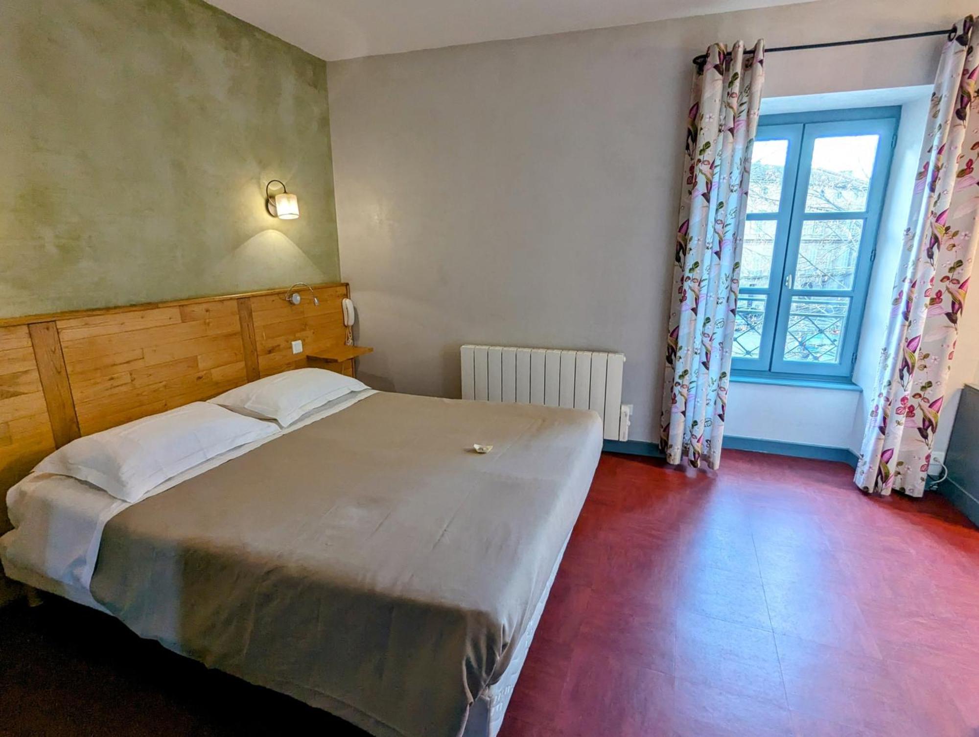Hotel Le Quatorze Figeac Bagian luar foto